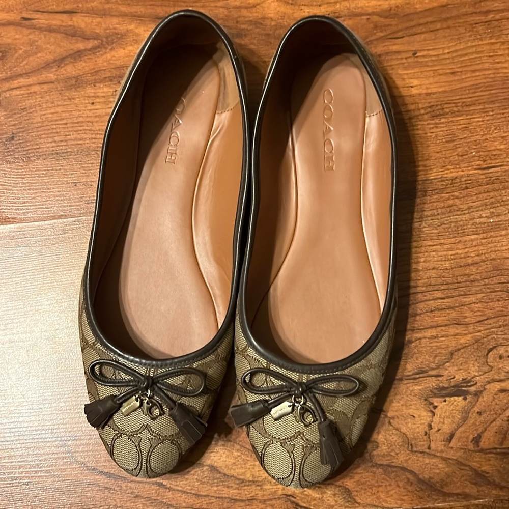 Women’s COACH size 11.